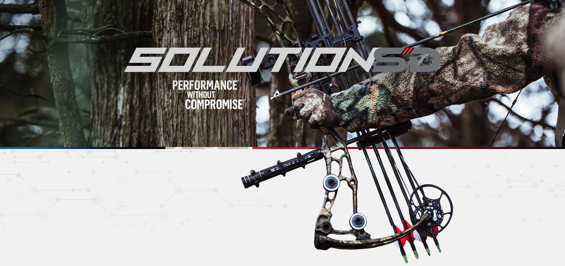 Bow hunter wearing camo clothes shooting a Bowtech Solution SD archery compound bow